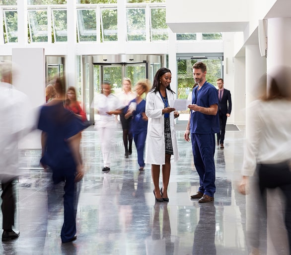 Healthcare professional smiling at a medical facility near Tributary in Nassau County, Florida
