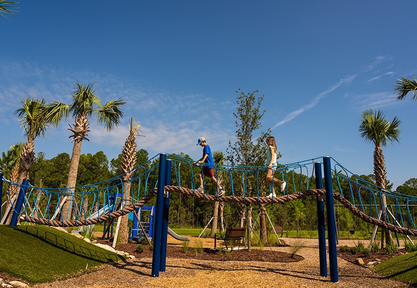 kids playing at the tributary tot lot