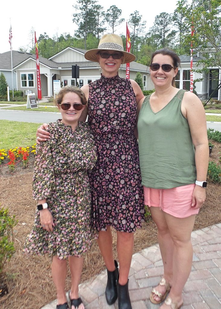 gaynelle james and two woman smiling at Tributary Realtor Event