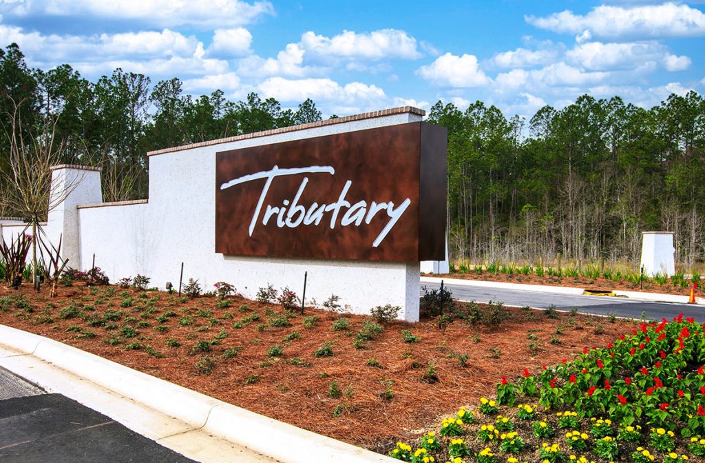 tributary&#039;s monument sign just outside the community