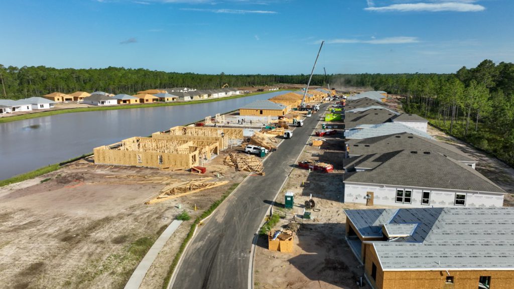 aerial of the community home construction at tributary