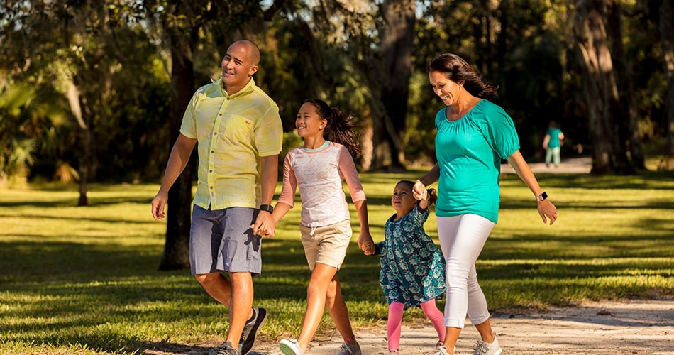 family walking in nassau county park