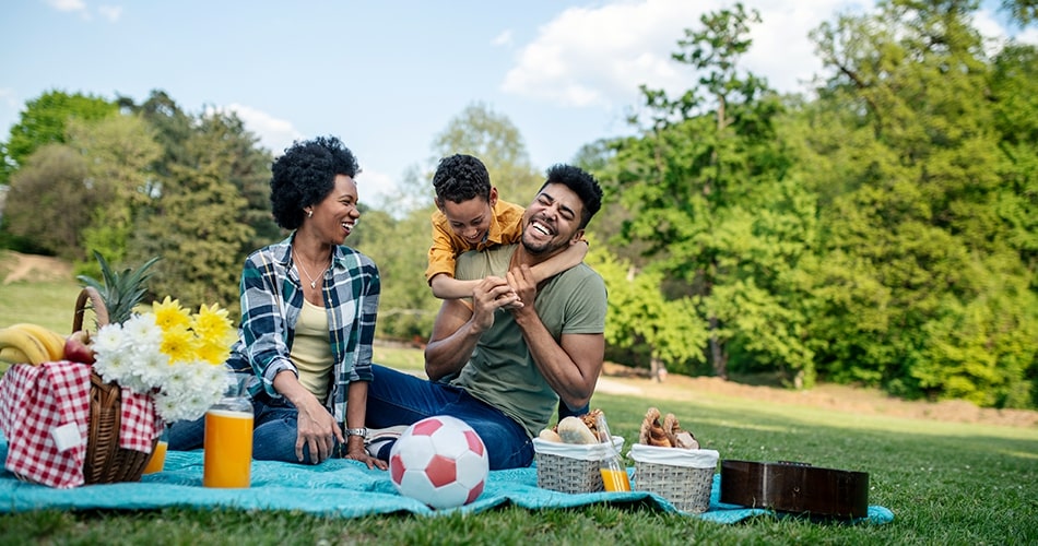 family having a picnic outdoors