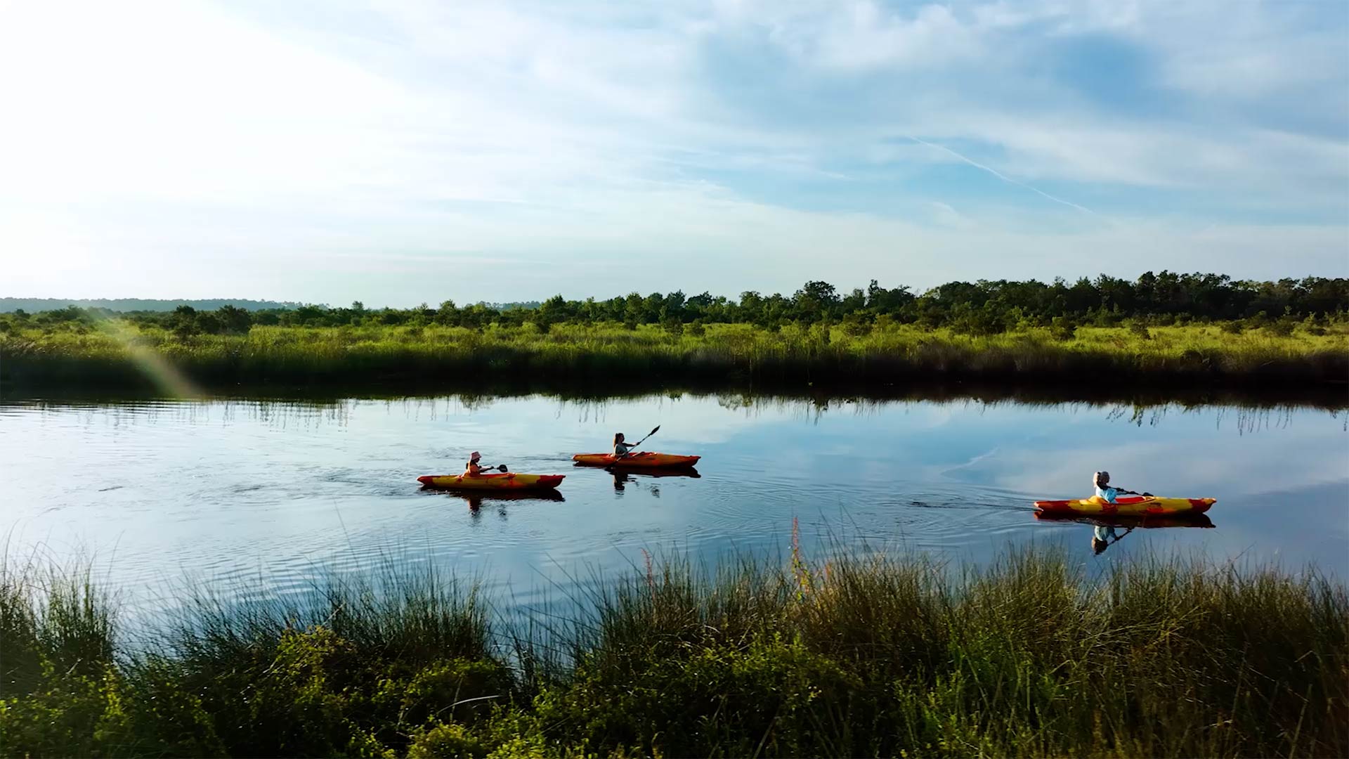 nassau county residents kayaking on boggy creek