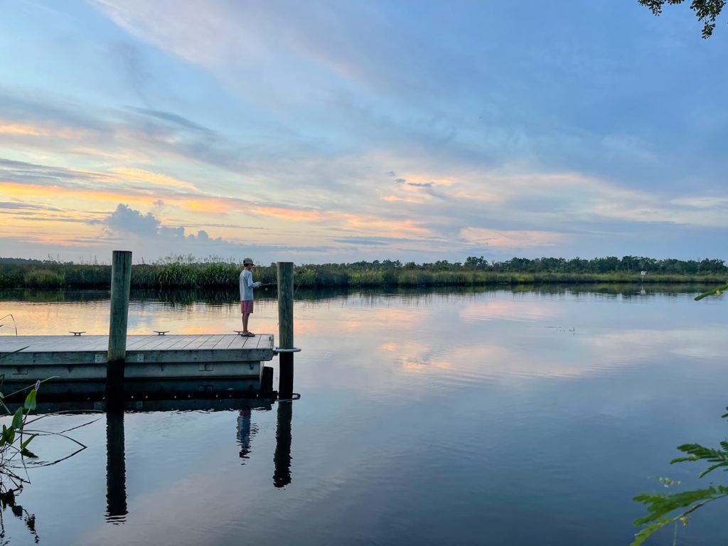 boy fishing on the nassau river