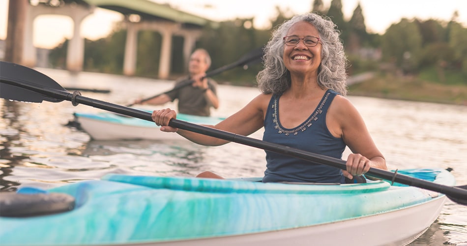 retire to florida woman kayaking on the nassau river
