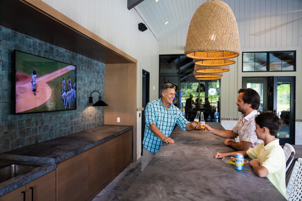 tributary residents having a snack at the amenity center bar