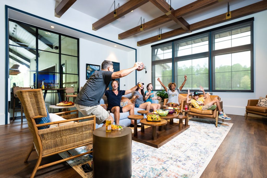 tributary residents watching a football game at the amenity center