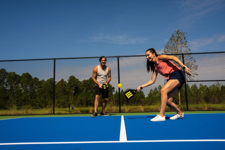 tributary residents playing on the pickleball courts