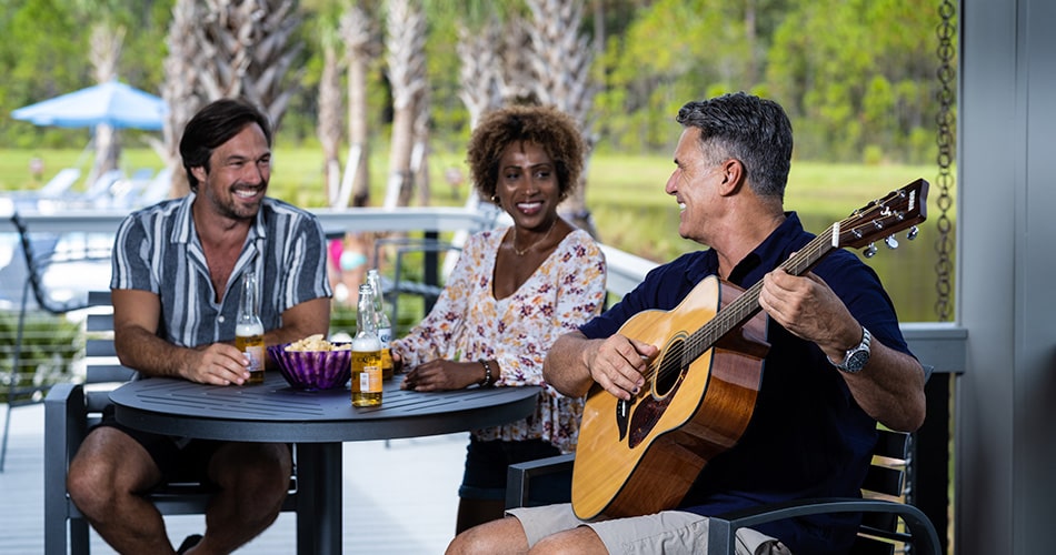 adult friends hanging out at tributary amenity center