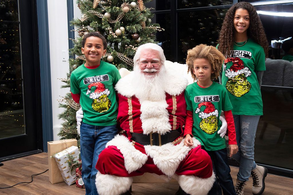 santa claus with families at tributary