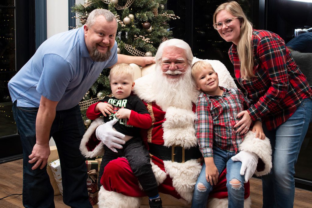 santa claus with families at tributary