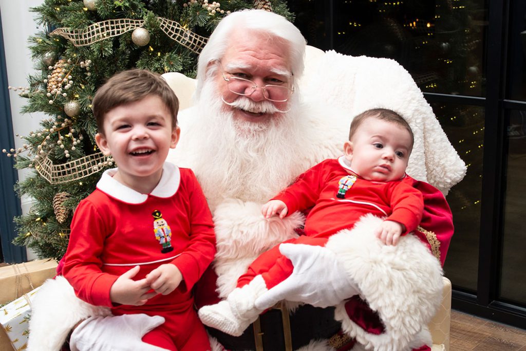 santa claus with families at tributary