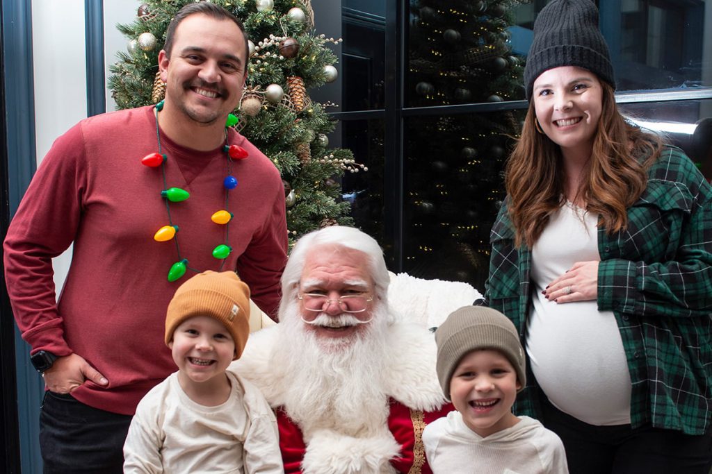 santa claus with families at tributary