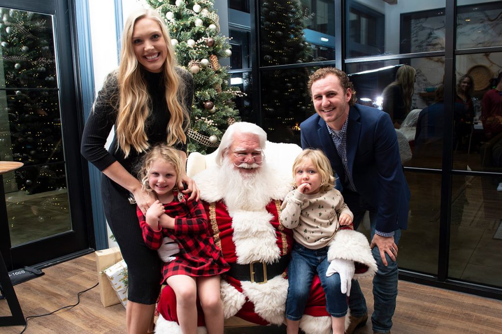 santa claus with families at tributary