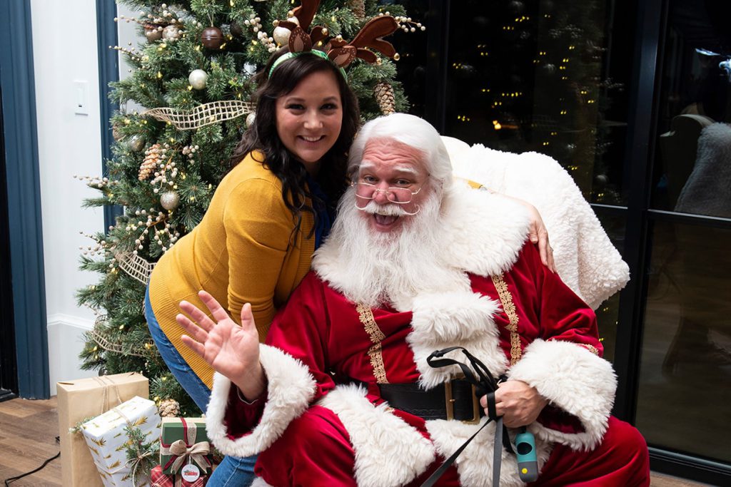 santa claus with families at tributary