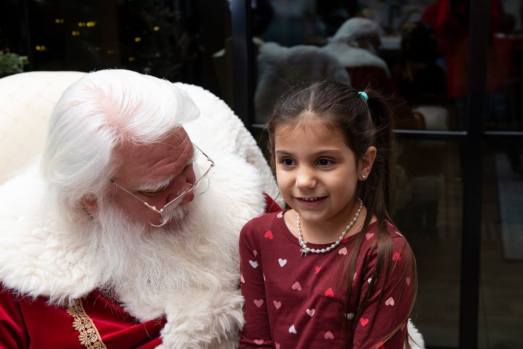 santa claus with families at tributary