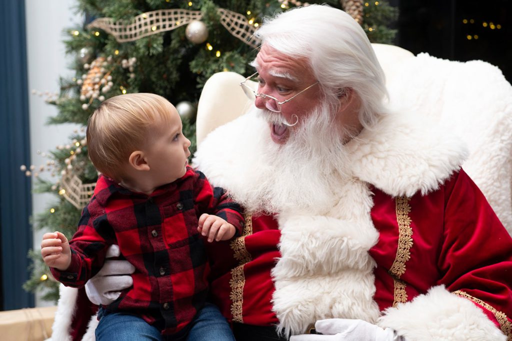 santa claus with families at tributary