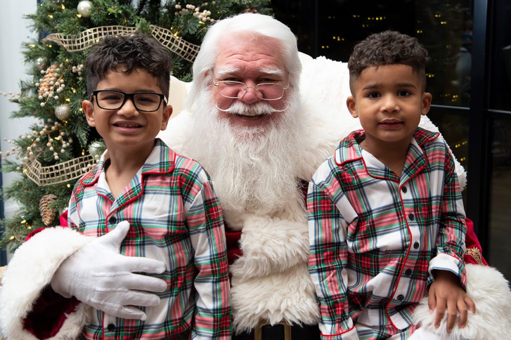 santa claus with families at tributary