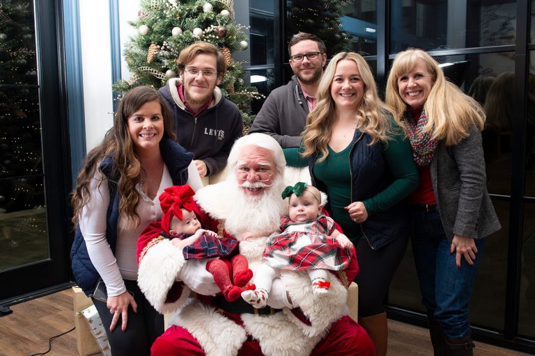 santa claus with families at tributary