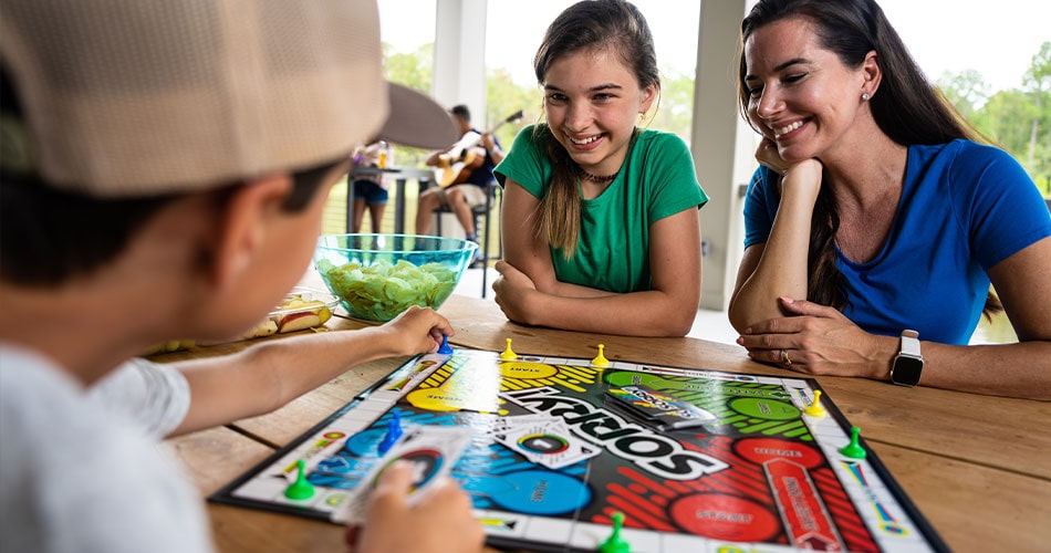 first-time homeowners family playing board games