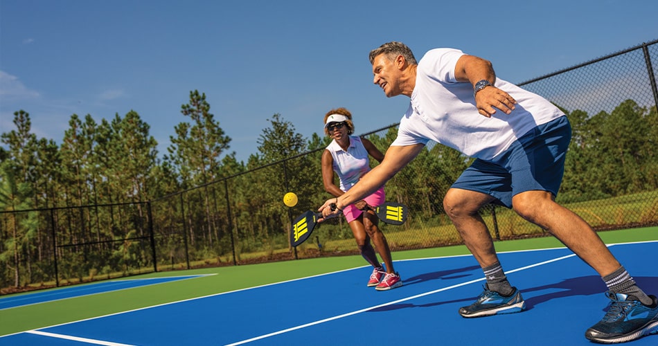 Active-Adults playing pickleball at Tributary