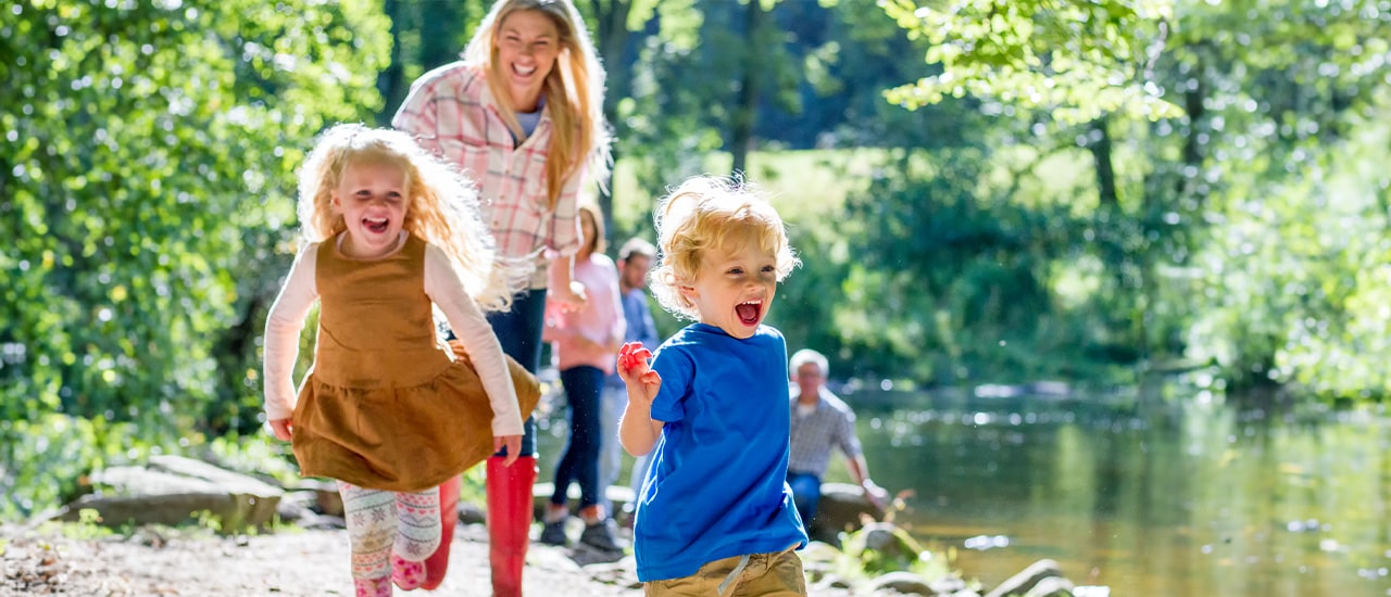 Florida Family running along stream