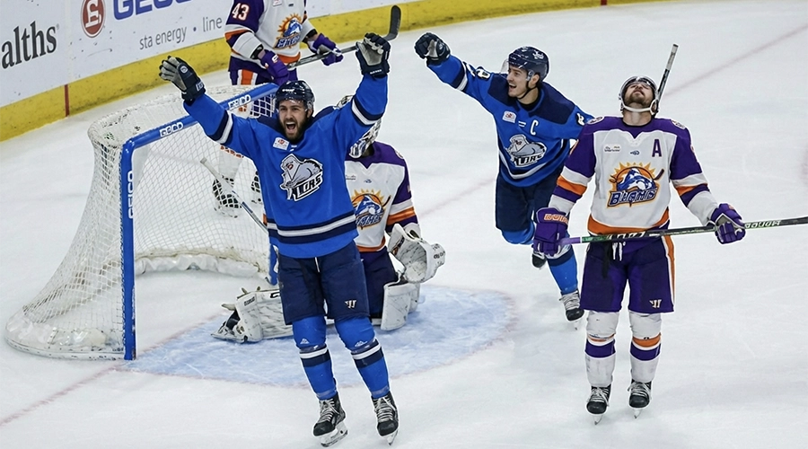 Jacksonville Icemen players celebrating a win on the ice