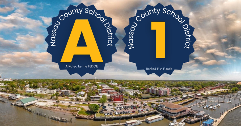 Aerial waterfront town with Nassau County School District A rating and #1 ranking badges